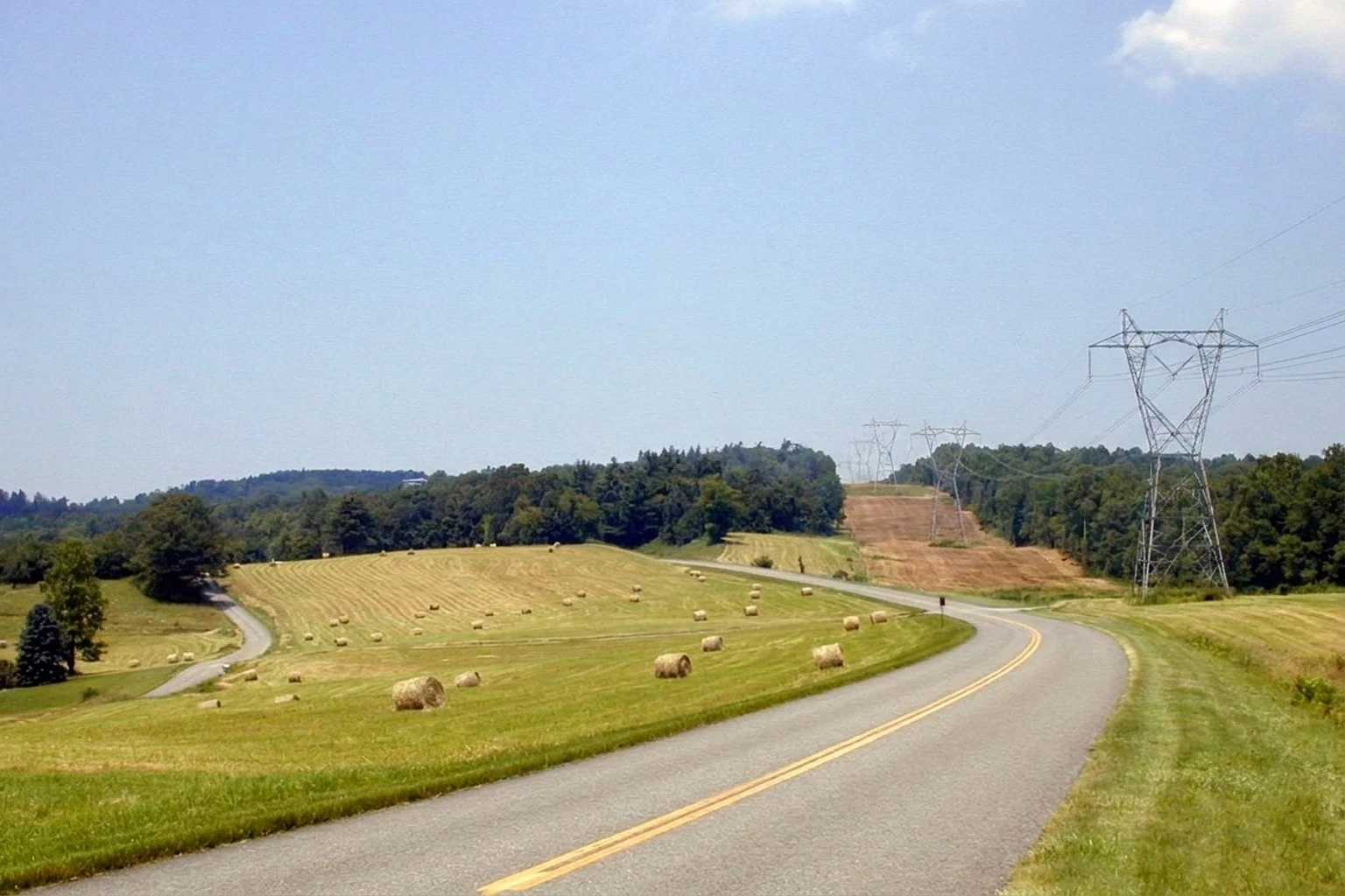 Illustrative Blue Ridge scene with a cleared high-voltage transmission corridor